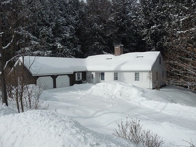 Front of home with 2-car garage