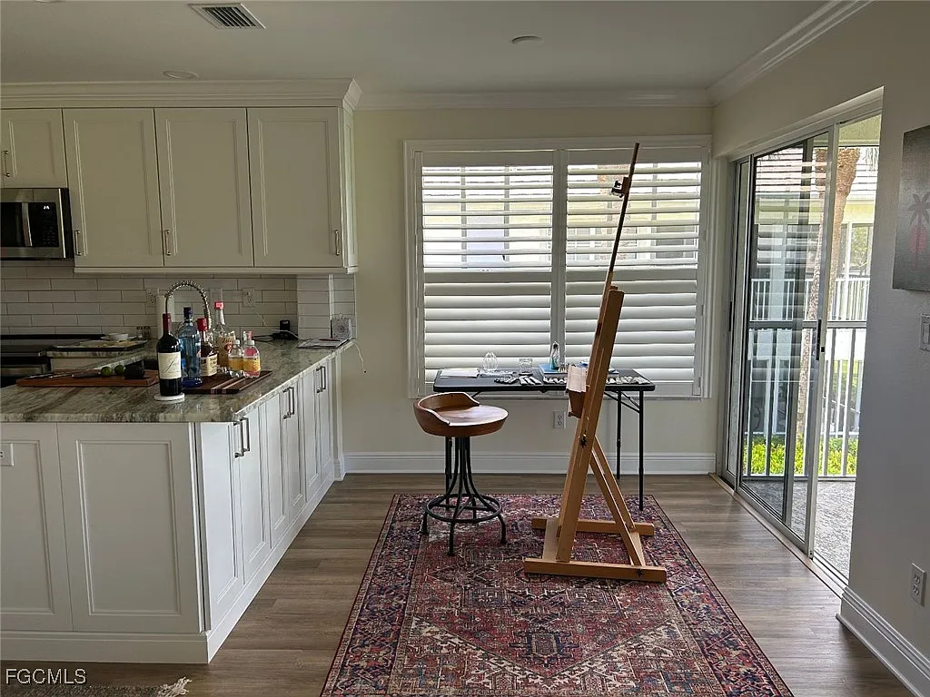 Building Photo - 8361 Grand Palm Dr #2