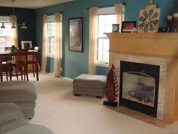 Large living/dining area with gas fireplace