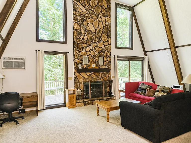 Living room with vaulted ceiling