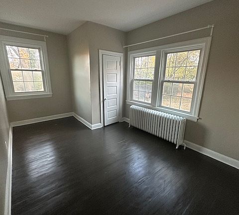 Large bedroom freshly painted.