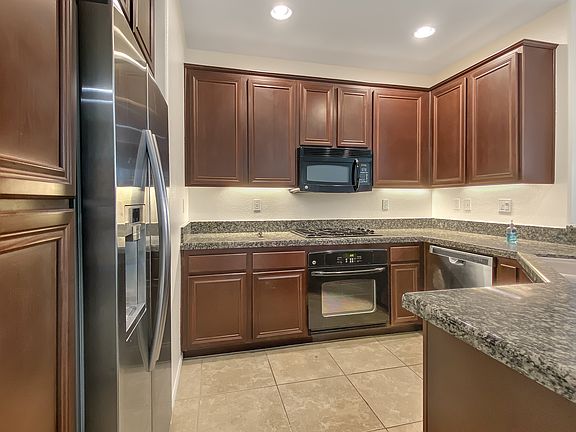 5th image of 8808 Promenade North Pl #1