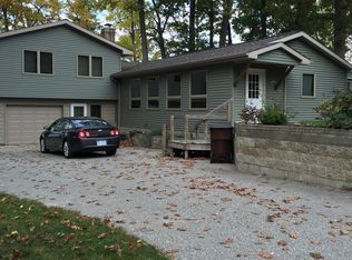 1087 E Hess Lake Dr, Grant, MI 49327