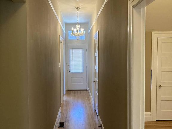 Hallway leading to the front door.