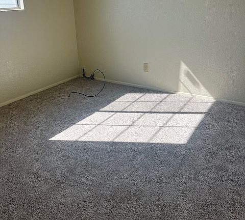 Bedroom with new carpet