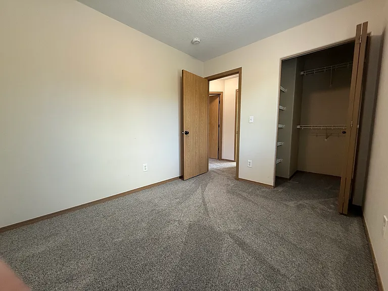 bedroom 2 with walk-in closet