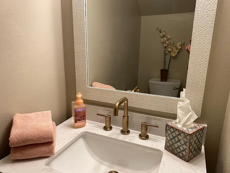 Guest half bath near living room_