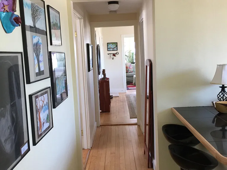 Looking from Kitchen to DR and LR beyond