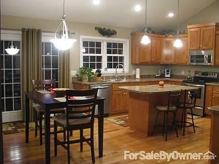 French doors to deck from eat-in kitchen