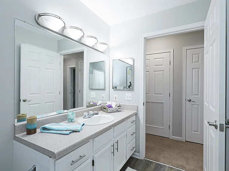 Bright, modern bathroom with ample counter space and sleek finishes for a clean, fresh look.