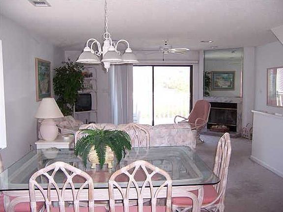 View of dining and living area from kitchen