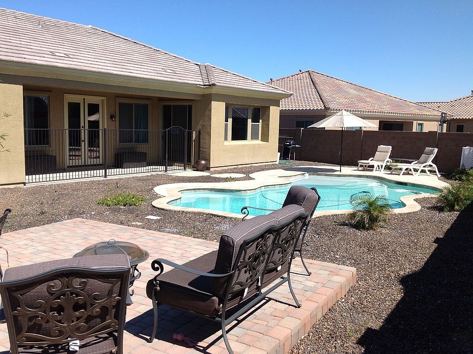 back yard with large play pool and shallow lagoon for children to play