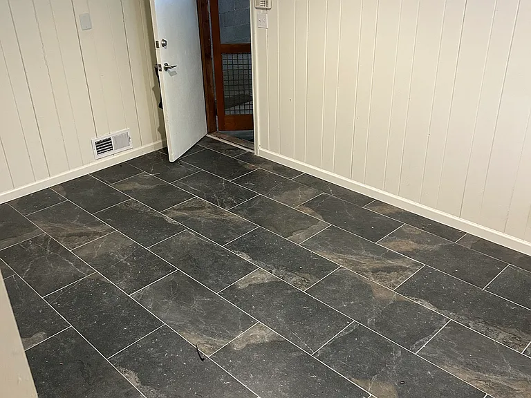 Large mud room/playroom off of garage