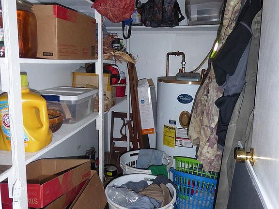 A pantry is located right off the back door and kitchen.