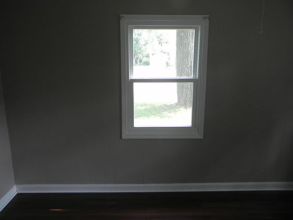 Fresh paint everywhere; shown here in bedroom.