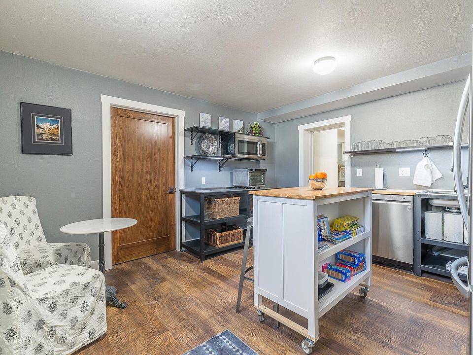 Kitchen. There is a microwave and electric slide in range with cook top.