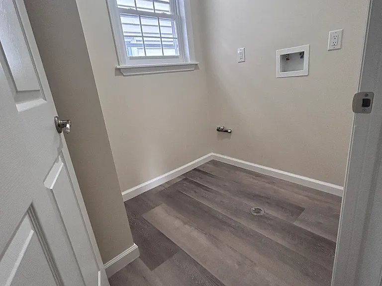 Laundry room ready for a full size washer and dryer