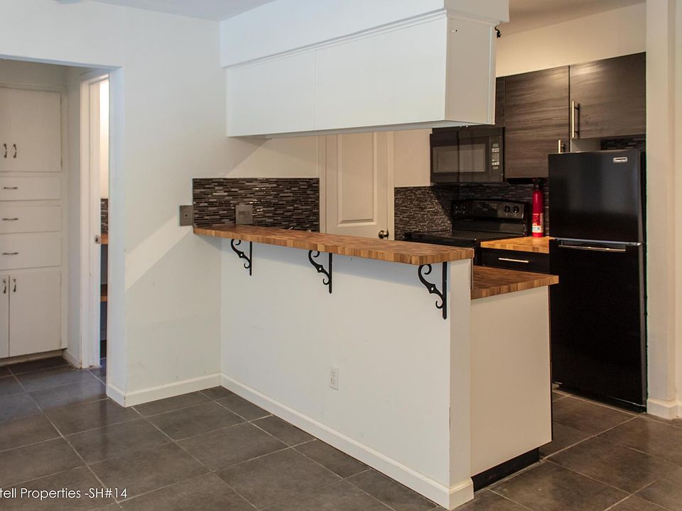 Another view of the kitchen and built in cabinets and drawers