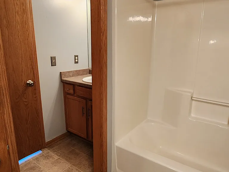 Main Bathroom seperate vanity for master bedroom use.