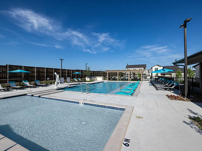 Swimming Pool with ample seating and lounge chairs