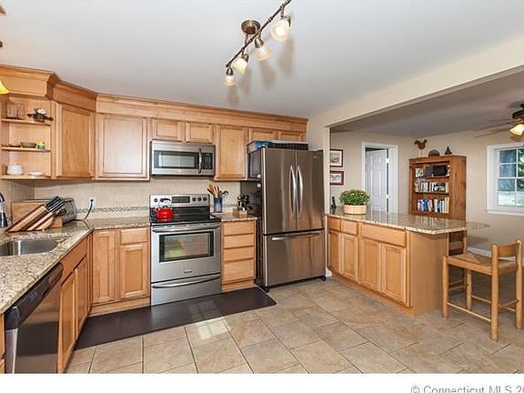 Lots of natural light flows through the kitchen windows and door to the deck.