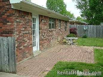 Backyard with brick patio