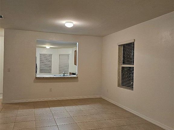 3rd image of 114 SE 3rd St