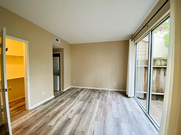 Bedroom with balcony view, very bright and open