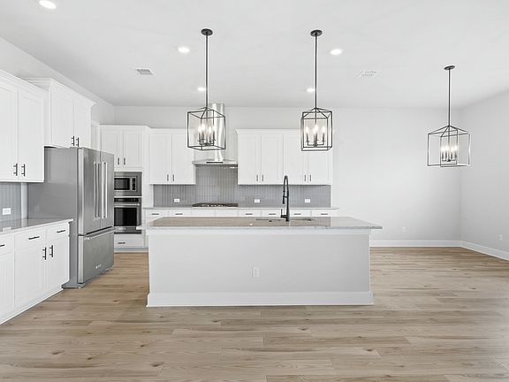 The kitchen has a convenient kitchen island.