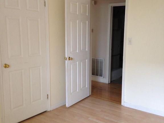 Bedroom with walk-in closet