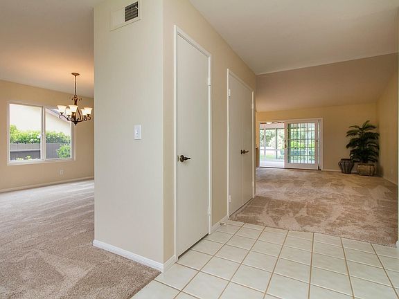 The home has been updated with brand new carpeting & two-tone designer paint throughout.