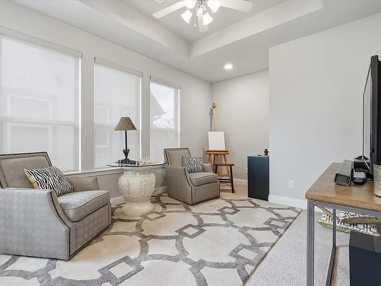 Discover the perfect bonus room designed to adapt to your lifestyle, whether utilized as a cozy media lounge, a home office, or a creative studio space.