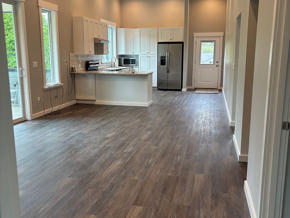 Kitchen and great room - tall ceilings throughout!
