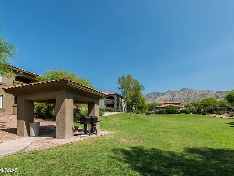 Covered gazebo with BBQs and green space