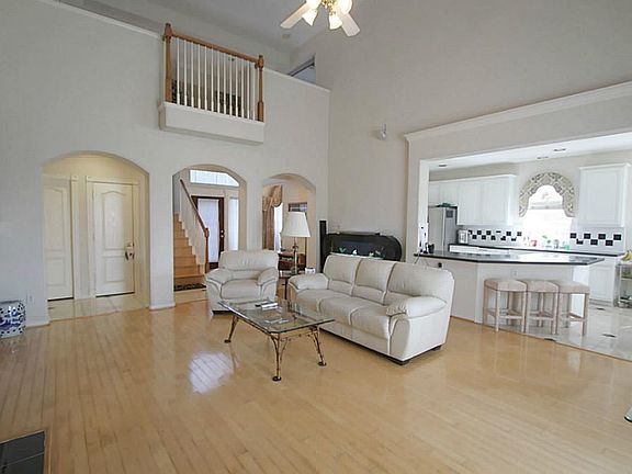 Big family room. Hardwood floor.