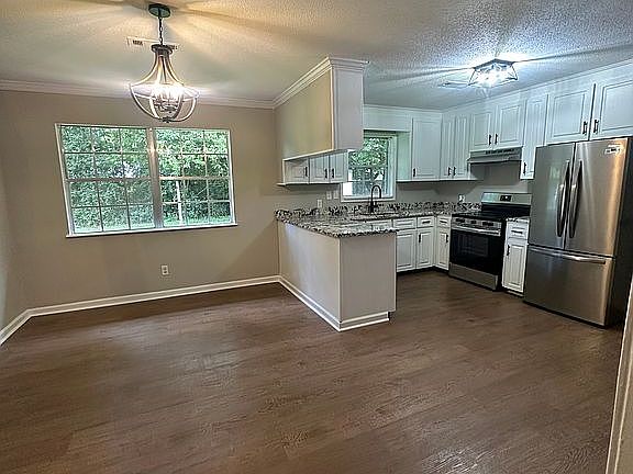 Kitchen/attached dining area