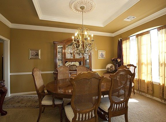 Formal Dining boasts tray ceiling