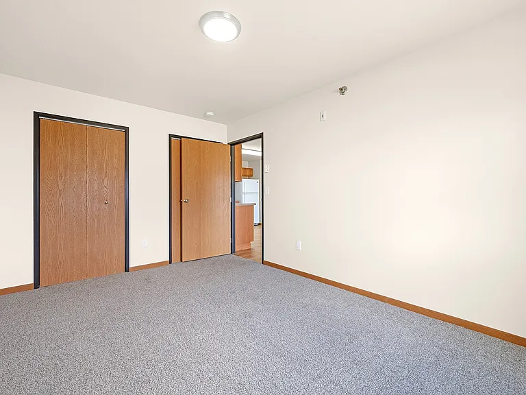Step into spacious living at Paramount at the Bluffs Apartments. This inviting area features plenty of natural light and ample closet space, perfect for your lifestyle. Don't miss out on your ideal homeschedule a tour today!