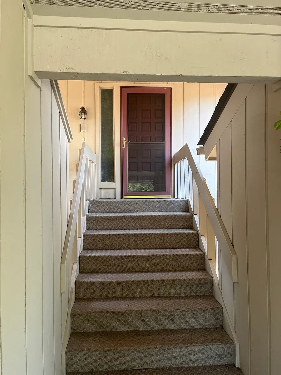 Entrance from covered parking. - 130 Glen Cannon Point