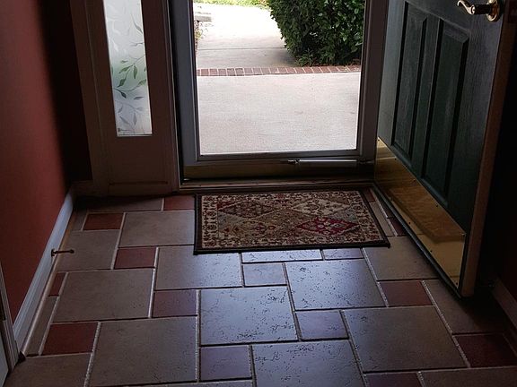 Entry area with designer ceramic tile flooring