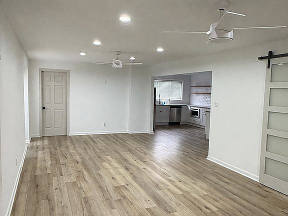 Spacious open concept living room, dining room area
