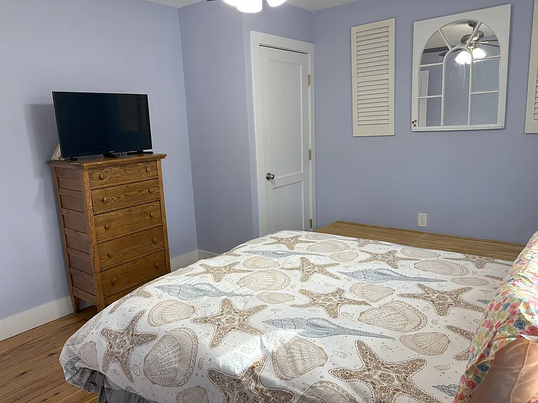 View of the TV and closet
