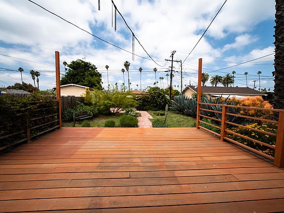 Back deck opening from bedroom and kitchen