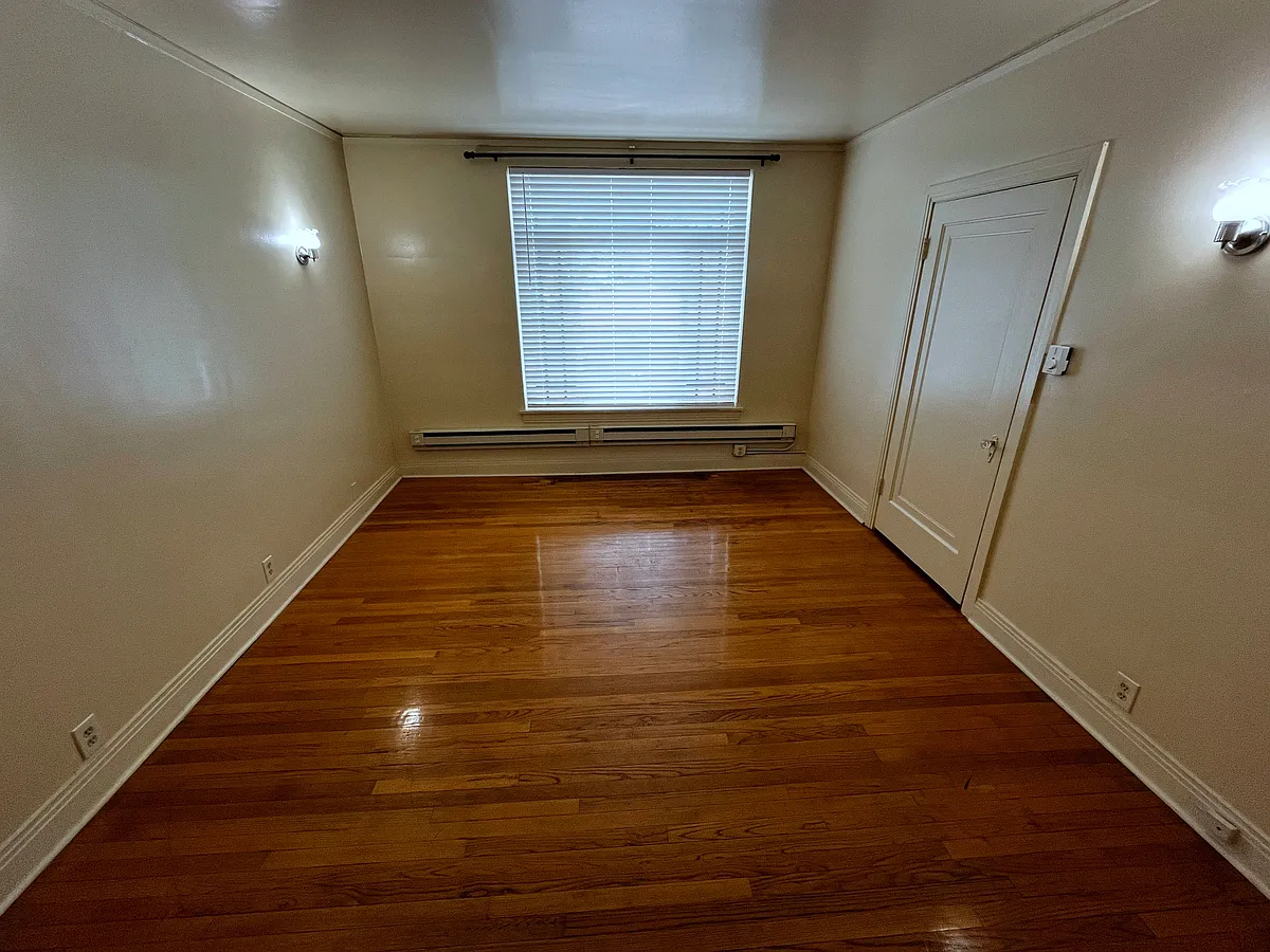Apt #200 - Living Room (View 2) - 232 N Genesee St #200