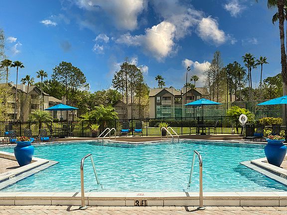 Resort Pool with Sundeck and Gas Grills