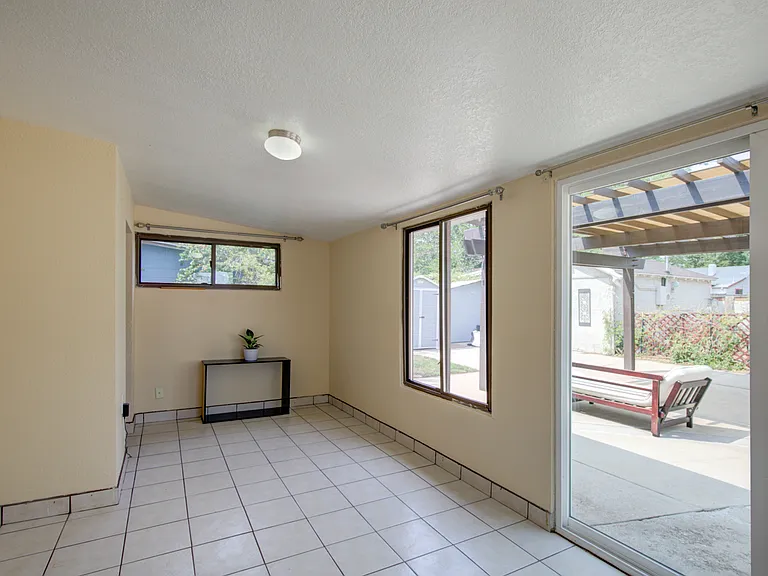 12 x17 room with closet on left ..addition to the back of the house. sliding glass door to back yard