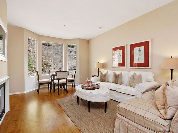 Living room w/ large windows