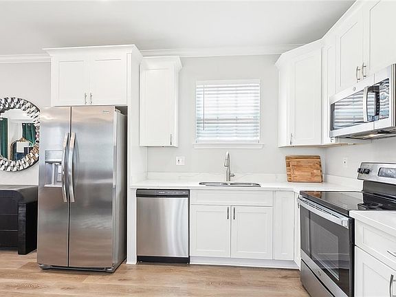 5th image of 1232 Louisa St