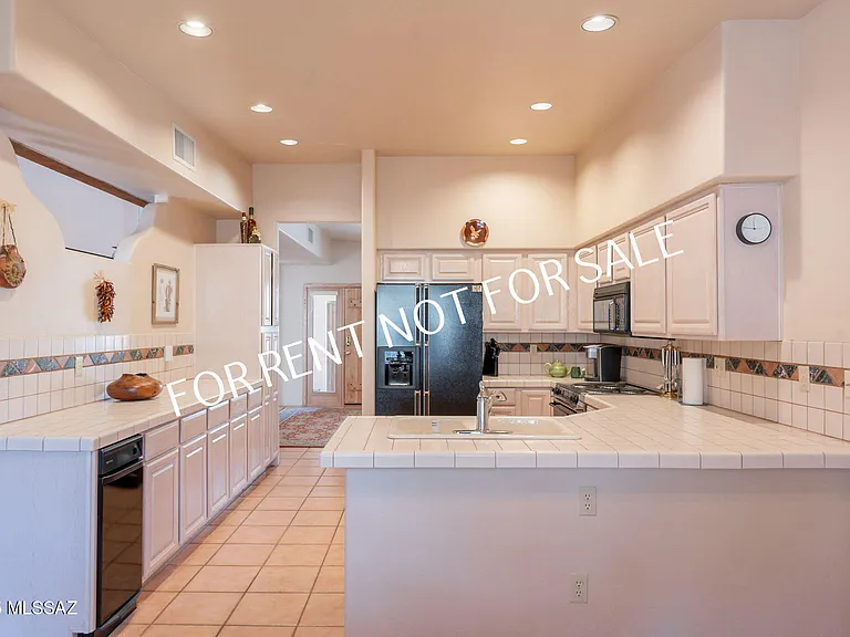 9876 N Ridge Shadow Pl — Photo 13