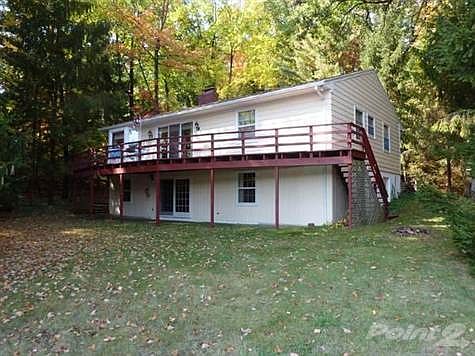 Spacious deck off living room overlooking the lake.